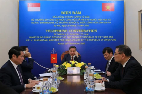 越南公安部与新加坡内政部长兼律政部促进合作关系