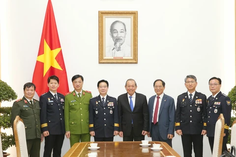 越南政府副总理张和平会见韩国警察厅司令金昌勇一行