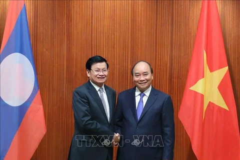 推动越南与老挝合作关系不断向前发展