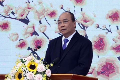 政府总理阮春福向越南企业界及企业家致春节慰问信