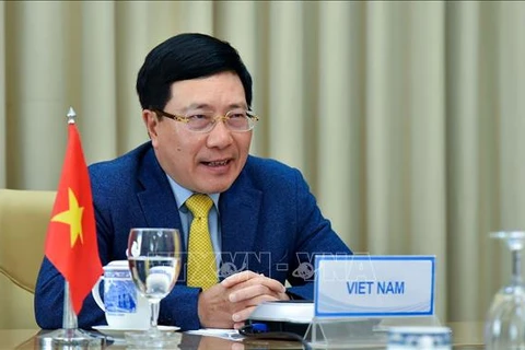 越南政府副总理兼外长范平明与委内瑞拉外长豪尔赫·阿雷亚萨举行视频会谈