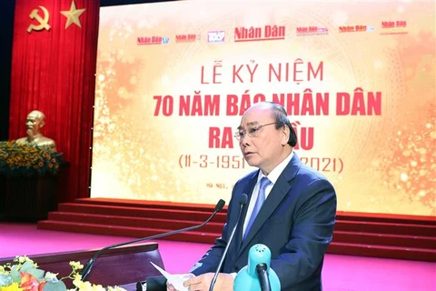 阮春福出席《人民报》创刊70周年纪念典礼