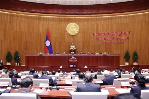 越南党和国家领导人向老挝国家、政府和国会致贺电