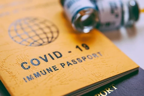 考虑试用“疫苗旅游护照”