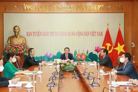 越共中央宣教部部长阮仲义与中共中央宣传部部长黄坤明举行视频会谈