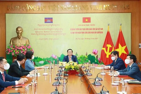 促进越共中央宣教部与柬埔寨人民党中央宣教委员会的合作