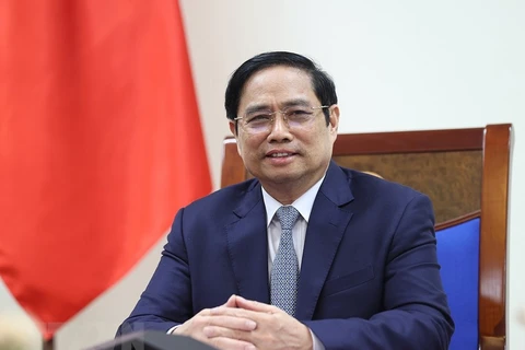 越南政府总理范明政与美国总统气候特使克里通电话
