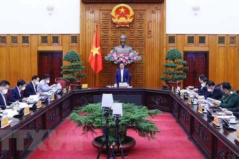 政府总理范明政就经济社会发展措施同岘港市领导举行座谈会