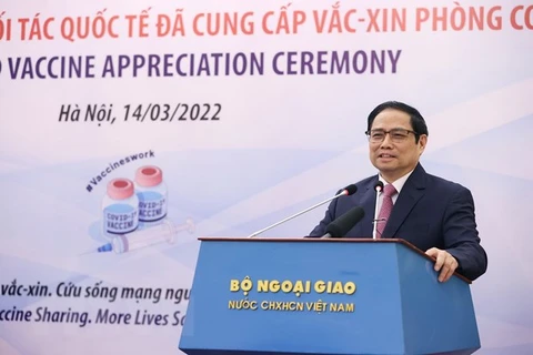越南政府总理范明政：越南呼吁国际团结 坚持多边主义 共同抗击疫情
