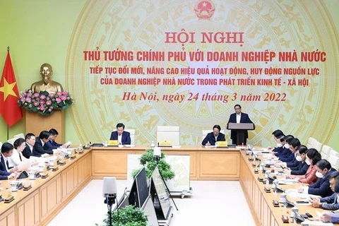 越南政府总理范明政主持全国国有企业代表视频会议