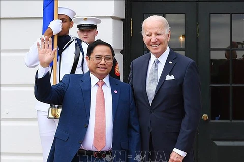 越南政府总理范明政会见美国总统拜登