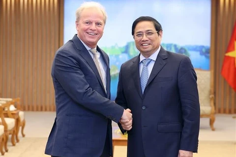 越南政府总理范明政会见世行首席执行官阿克塞尔·冯·托森伯格