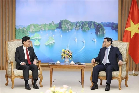 越南政府总理范明政会见新加坡副总理王瑞杰