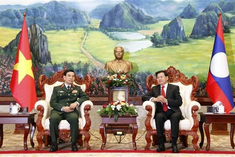 老挝党和国家领导人会见越南国防部长潘文江