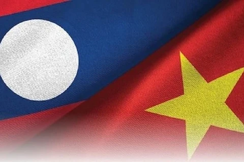 老挝副总理吉乔·凯坎匹吞会见越南红十字会中央委员会主席裴氏好一行