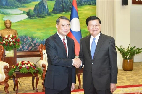 越共中央办公厅主任黎明兴对老挝进行工作访问