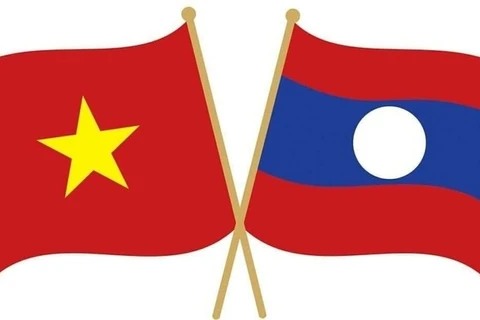 越南党和国家领导人向老挝致国庆贺电