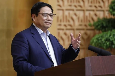 越南政府总理范明政：坚定不移保持宏观经济稳定 积极促进经济增长目标