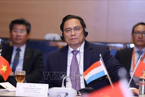 越南政府总理范明政会见卢森堡经济集团领导