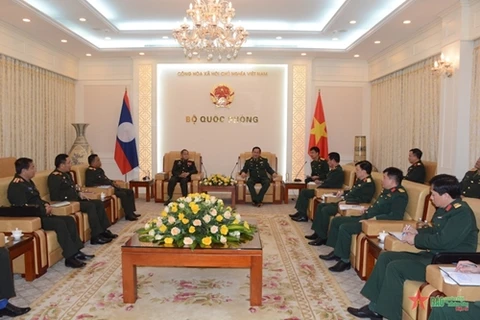 武明良上将会见老挝人民军总政治局代表团