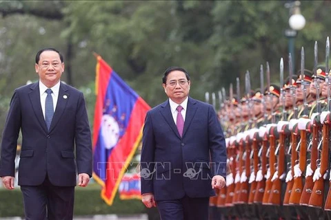 老挝报刊连载文章欢迎范明政总理正式访问