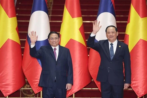 越南政府总理范明政访老之旅取得全面实质性成果