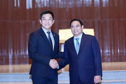  越南政府总理范明政会见新加坡国会议长陈川仁
