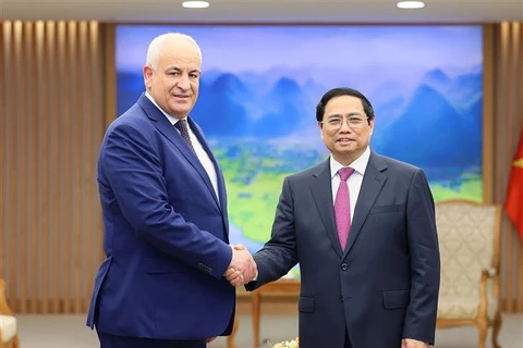 越南政府总理范明政会见巴勒斯坦内政部长