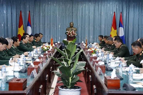 老挝人民革命党中央委员会总书记、国家主席通伦：防务合作是越老关系的重要支柱