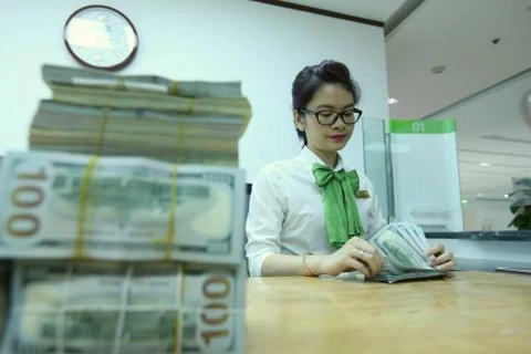 6月26日上午越南国内市场越盾对美元汇率中间价上调23越盾