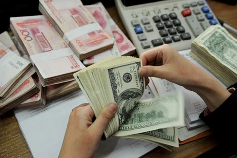 7月3日上午越南国内市场越盾对美元汇率中间价下调5越盾