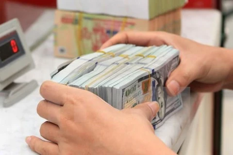 7月7日上午越南国内市场越盾对美元汇率中间价下调5越盾