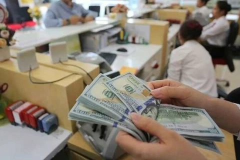 7月13日上午越南国内市场越盾对美元汇率中间价上调14越盾