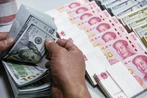 7月21日上午越南国内市场越盾对美元汇率中间价下调3越盾