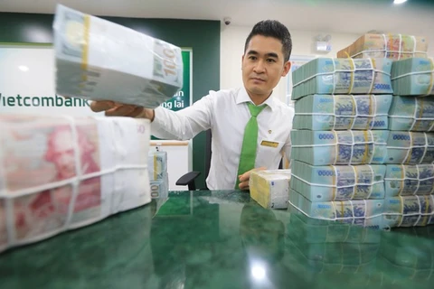 7月28日上午越南国内市场越盾对美元汇率中间价下调8越盾
