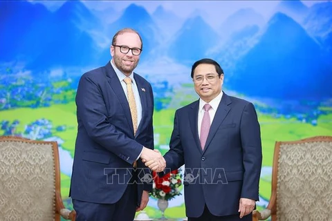 越南政府总理范明政会见美国众议员代表团