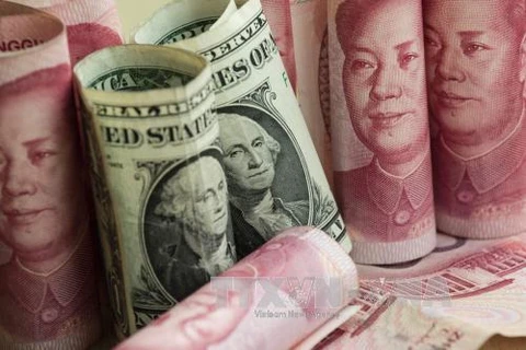 8月7日上午越南国内市场越盾对美元汇率中间价上调10越盾