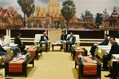 老挝总理高度评价越南企业对该国社会保障工作提供的支持