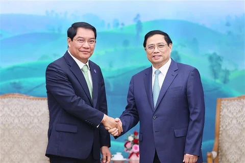 越南政府总理范明政会见老挝万象市市长阿沙庞通·西潘敦