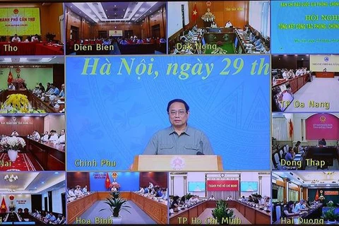 政府总理范明政：新冠肺炎疫情防控工作取得成功展现出越南精神、本领和智慧