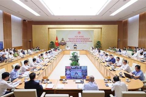 越南政府总理范明政主持召开全国消防工作会议