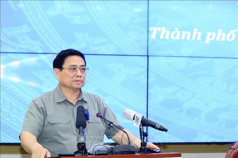 越南政府总理范明政主持召开胡志明市特殊发展机制和政策部署会议