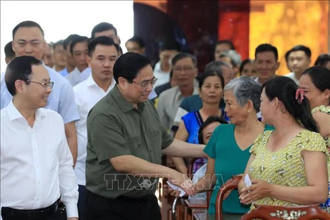 越南政府总理范明政春节前夕在芹苴市开展走访慰问活动