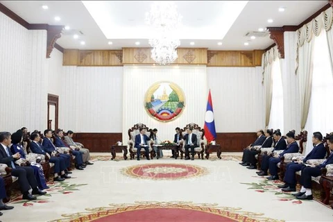 老挝总理希望两国首都成为越老地方间合作的典范 