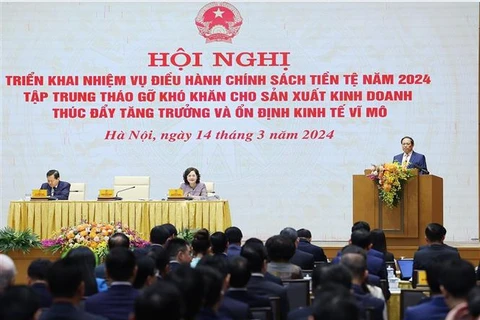 越南政府总理范明政出席2024年货币政策调控会议