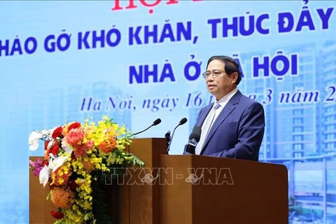 越南政府总理范明政主持召开消除困难 促进保障性住房发展会议