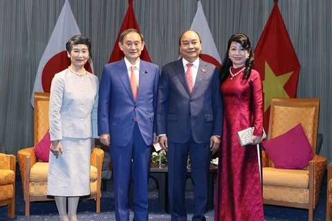 组图：日本首相菅义伟与夫人圆满结束对越南进行的正式访问之旅