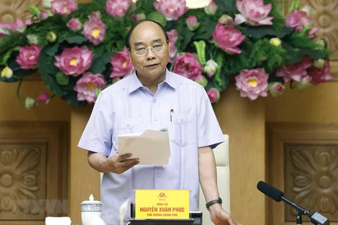 阮春福总理主持召开有关信贷体系结构重组的会议
