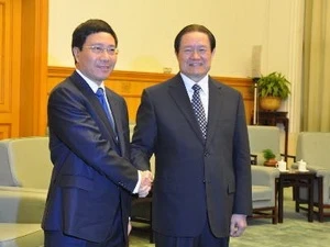 外交部长范平明会见中共中央政治局常委、中央政法委书记周永康