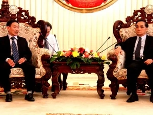 老挝总理通辛·坦马冯会见武春酒同志